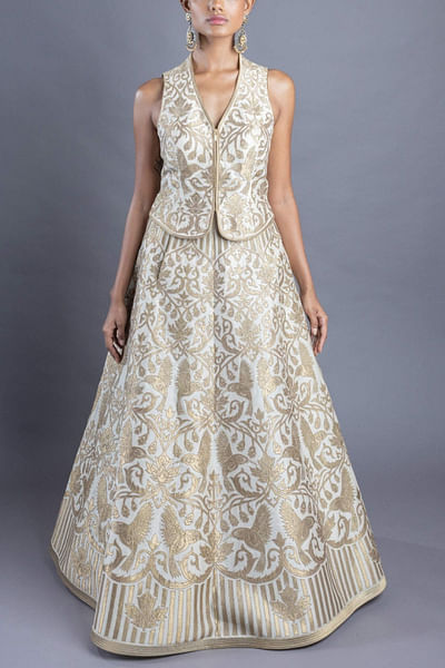 Gold accented lehenga and waistcoat