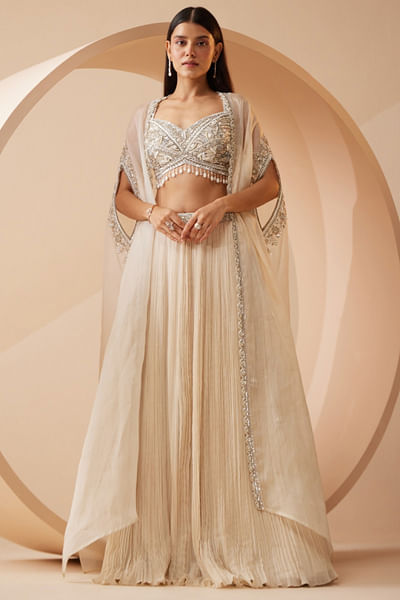Off-white embroidered cape and lehenga set