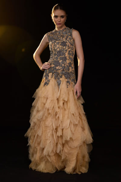 Gold embroidered and ruffle-layered gown