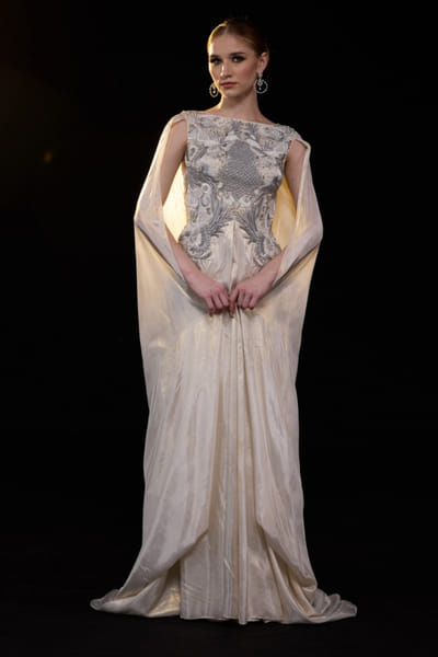 Ivory and silver embellished-draped gown