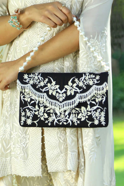 Black embroidered clutch
