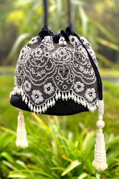 Monochrome embroidered bucket bag