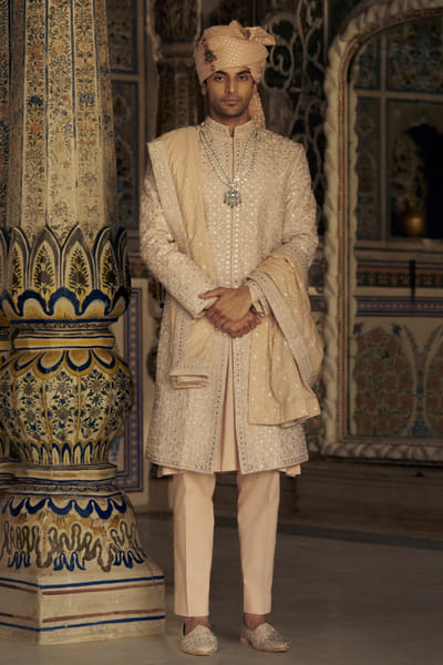 Nitika Gujral Peach zari and mirror embroidered sherwani set NIKSEP25D132852