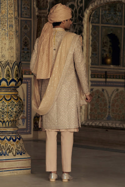 Nitika Gujral Peach zari and mirror embroidered sherwani set NIKSEP25D132852