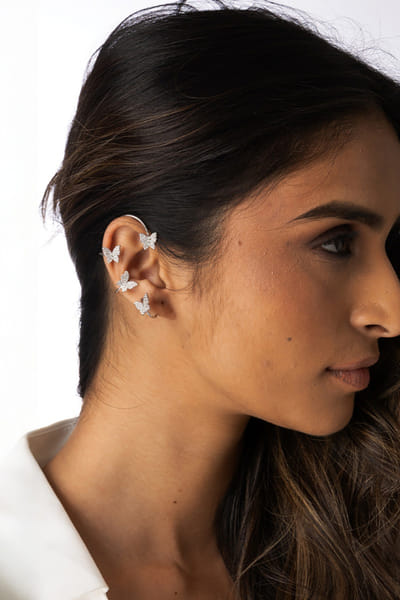 Silver butterfly embellished cuff earrings