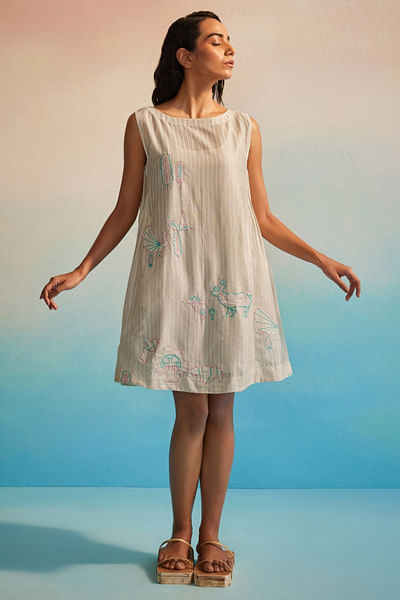 Ivory appliquéd and pleated dress