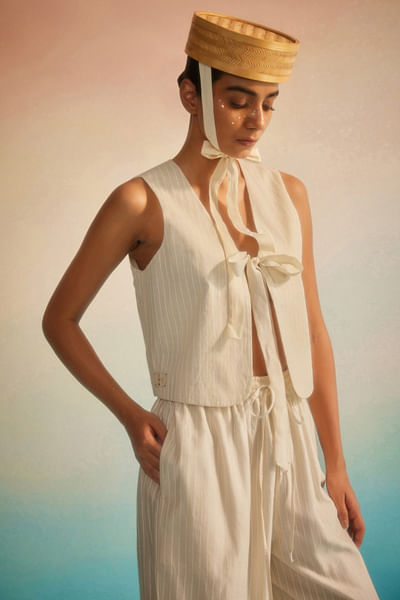 Ivory appliqué and patchwork reversible vest