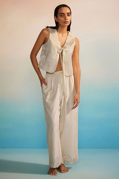 Ivory appliquéd and striped pants