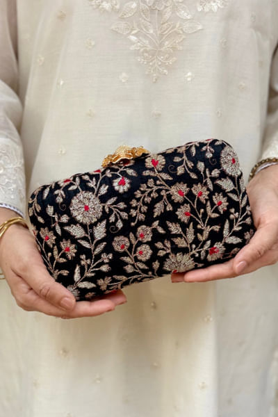 Black floral embroidered clutch