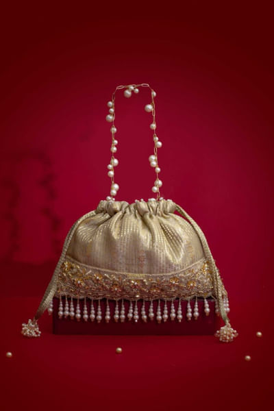 Grey tassel embellished potli bag