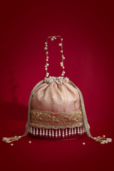 Pink cutdana-pearl embellished potli bag
