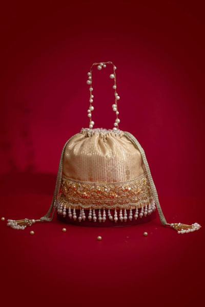 Beige floral embroidered potli bag