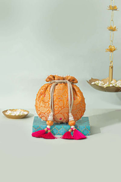 Orange floral woven banarasi silk potli bag
