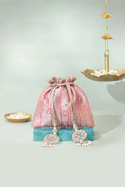Pink woven banarasi silk potli bag