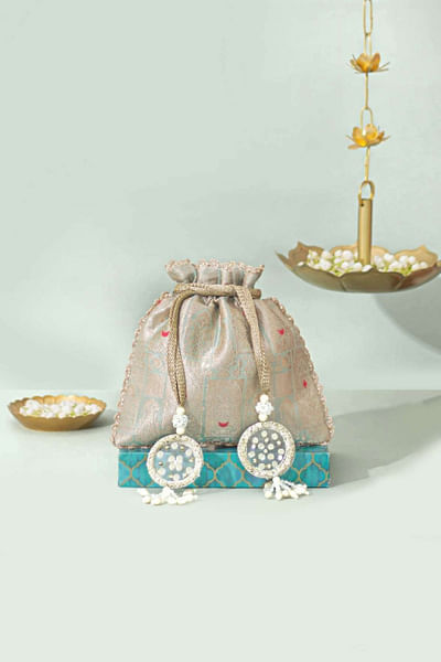 Ice blue woven banarasi silk potli bag