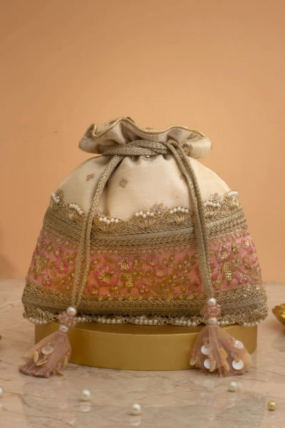 Beige zari buta embroidered potli bag