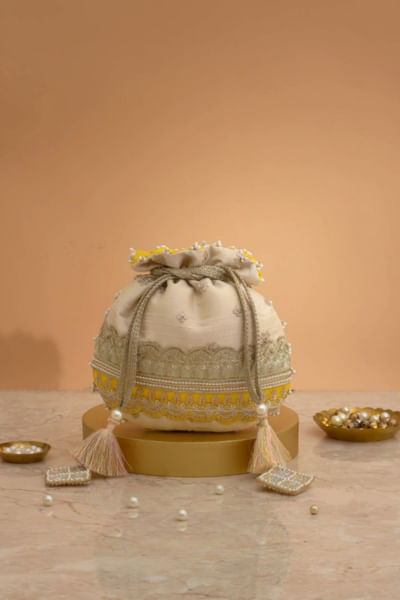 Mint and yellow embroidered potli bag