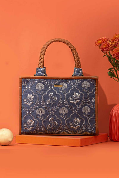 Blue thread embroidered handbag
