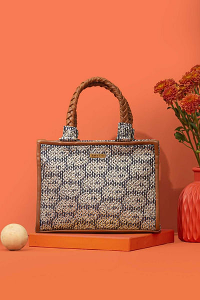 Indigo thread embroidered handbag