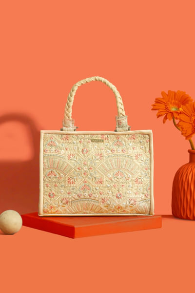 Beige thread embroidered handbag
