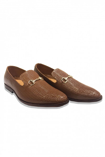 Glossy brown loafers