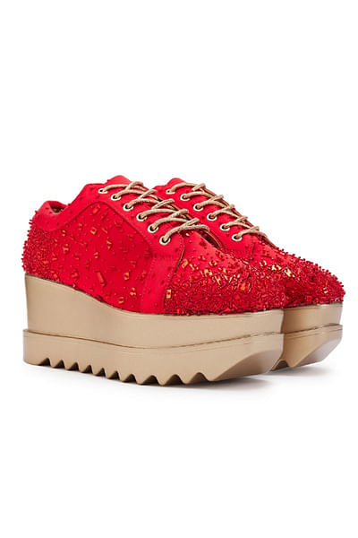Red mirror-cutdana embroidered wedge sneakers