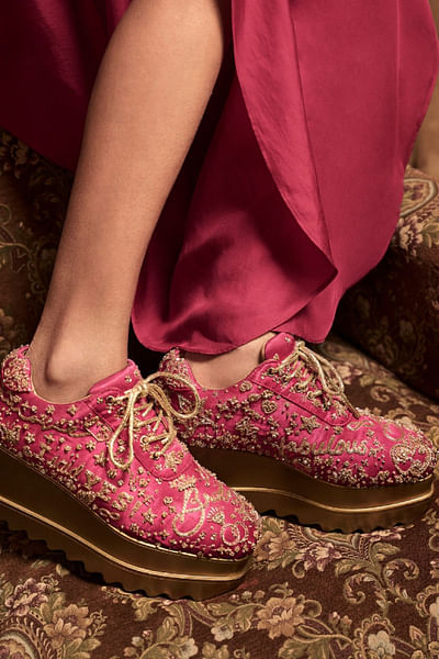 Fuchsia pink embellished wedge sneakers