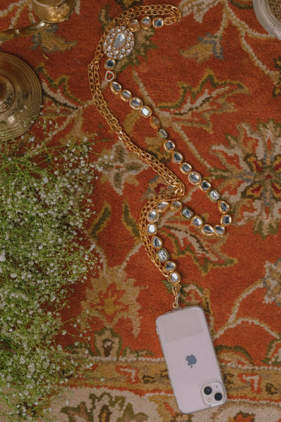 Gold polki embellished mobile chain
