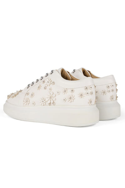 Anaar White tonal laser cut 3D floral sneakers ANAAJUN26D146882