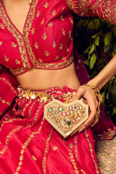 Gold polki stone embellished clutch