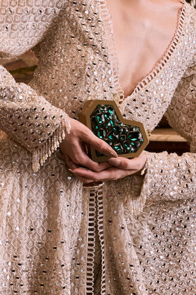 Emerald Swarovski stone embellished clutch