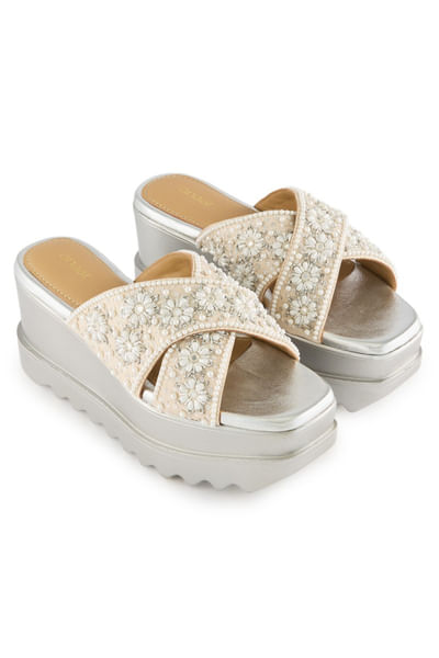 Beige embroidered slip-on sandals