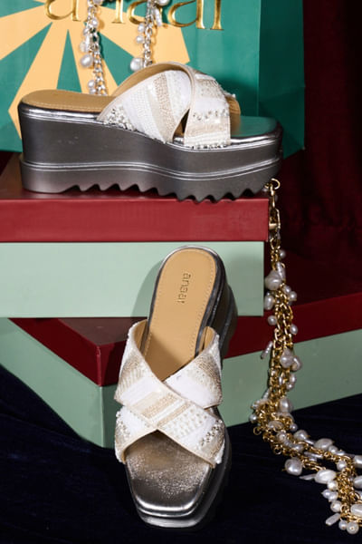 Off-white crisscross embroidered slip-on sandals