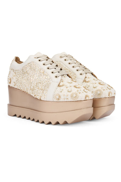 Ivory embroidered sneakers