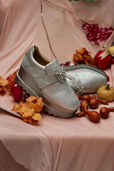 Silver butterfly buckle wedge sneakers