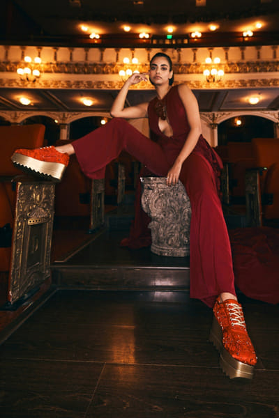 Red cutdana embellished wedge sneakers