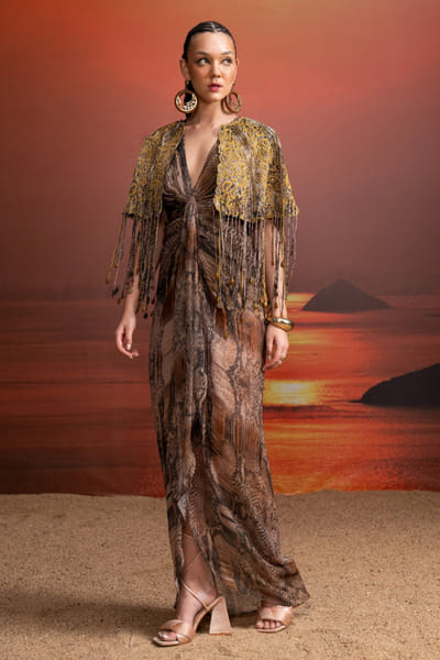 Brown tasselled cape and printed draped dress