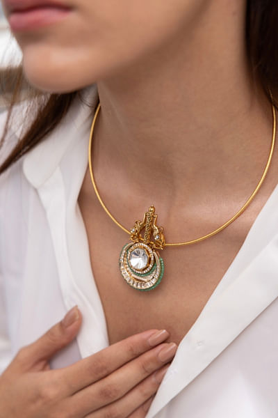 Gold crescent pendant necklace