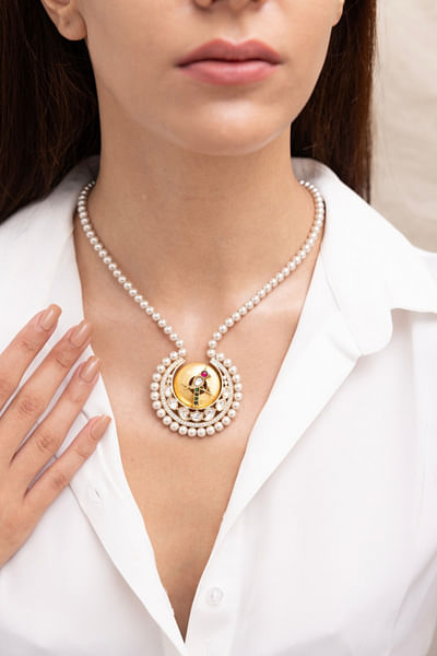 Gold crystal embellished necklace