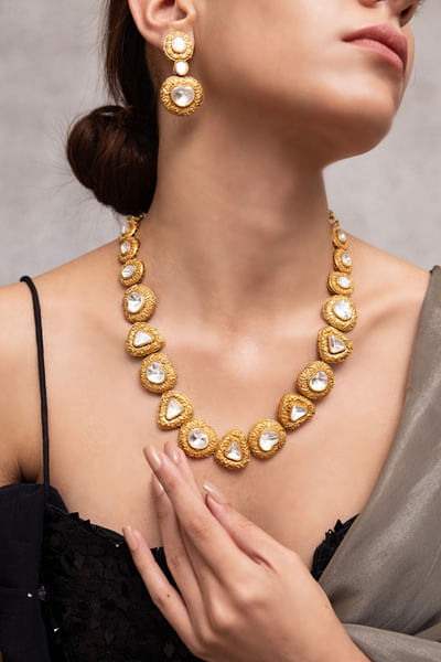 Gold stone studded necklace set