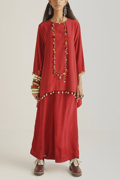 Red short kurta and palazzos