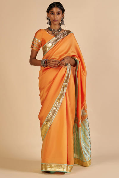 Orange and aqua embroidered chanderi blouse