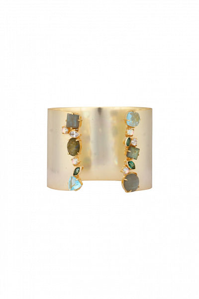 Thick gold cuff with stone detailing