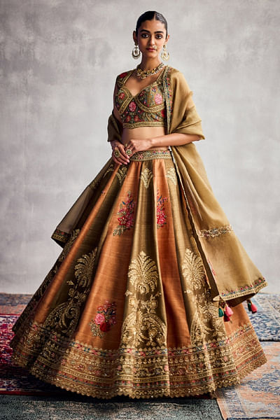 Orange and green embroidered lehenga set