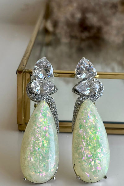 White embellished cocktail earrings