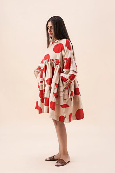 Red polka-dot block printed pleated dress