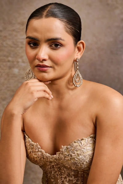 Gold pear shaped zircon earrings