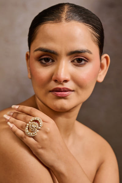 Gold diamond studded double finger ring