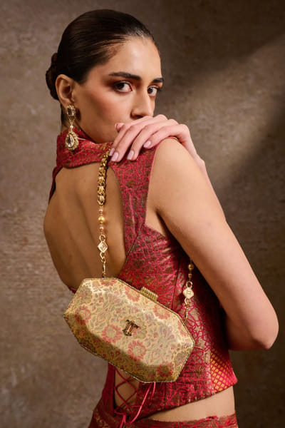 Ochre embellished brocade sling bag