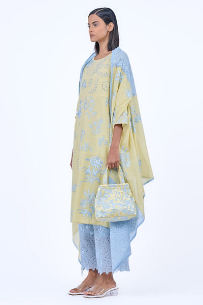 Yellow thread embroidered bag